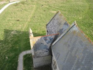 Holes in the roof caused by winter storms (Photo by Adrian Redwood)